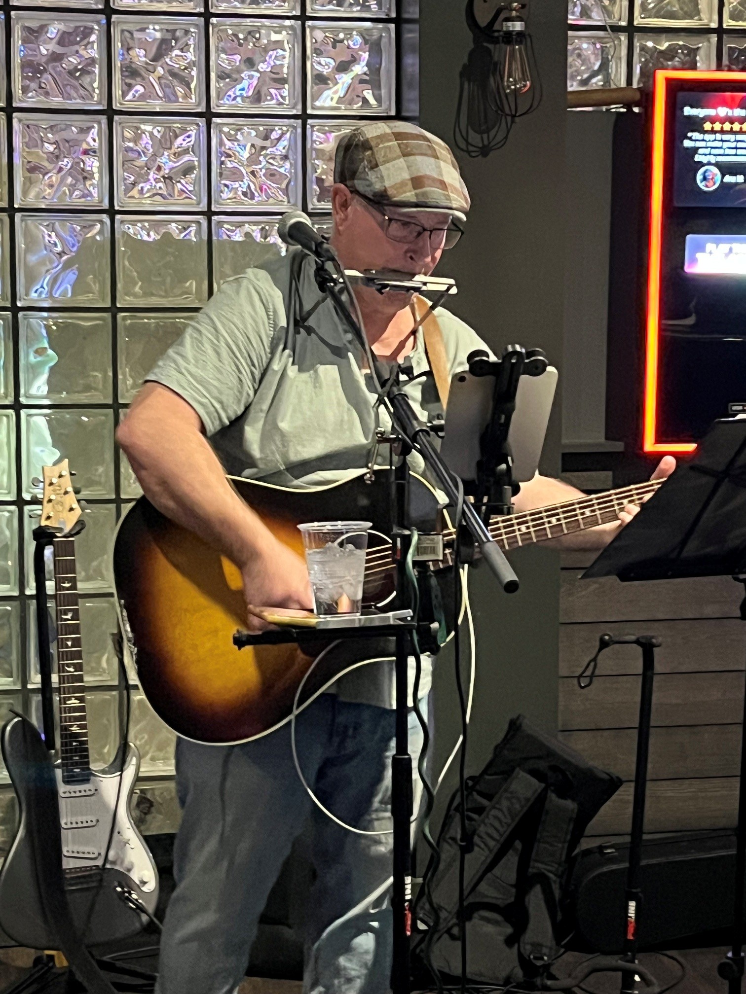 Steve playing harmonica and guitar simultaneously